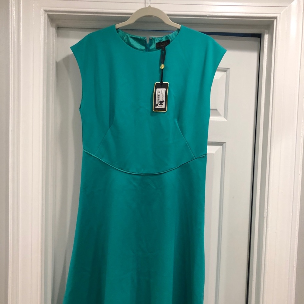 Steal in teal. Ted Baker 4, with tags.